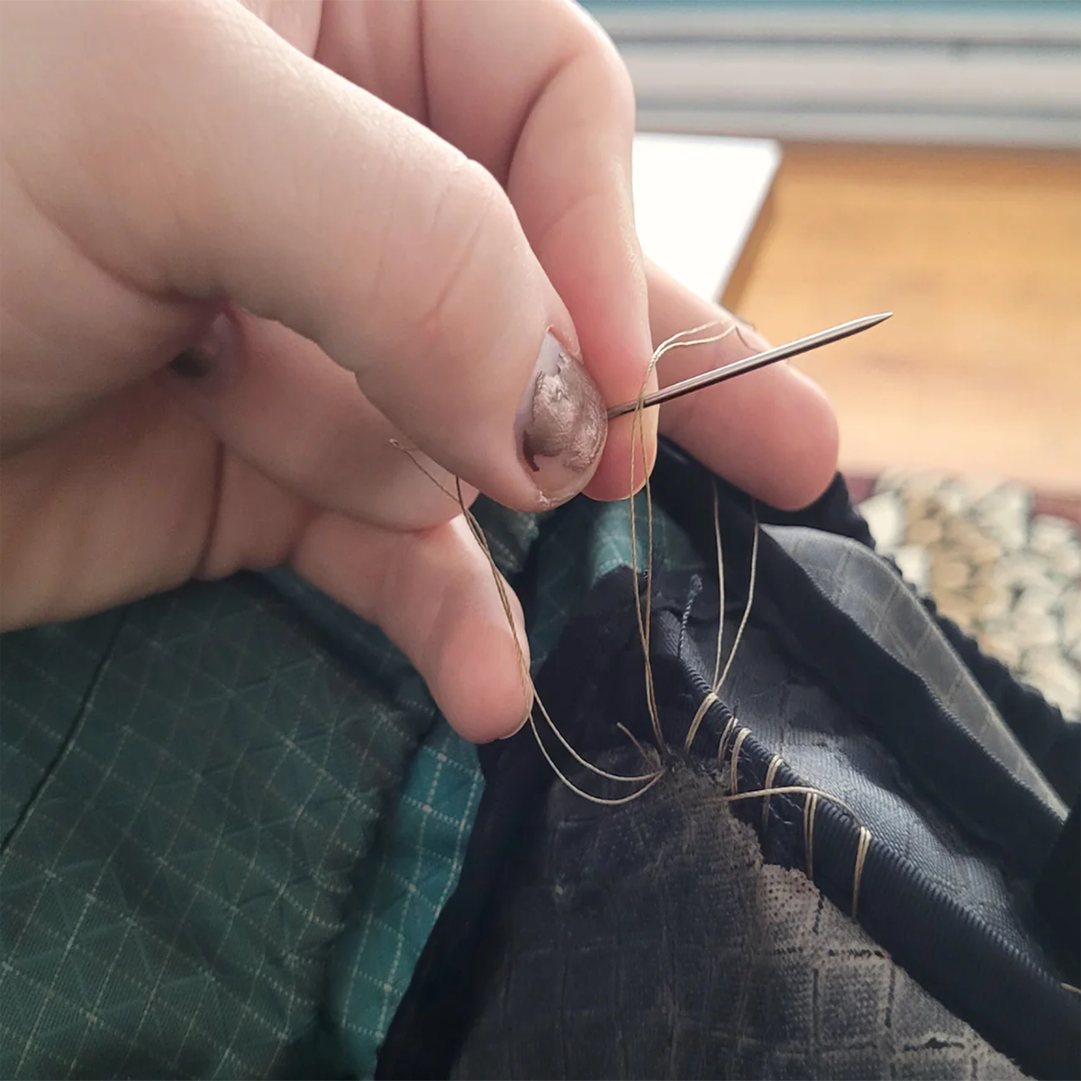 gear_repair_-_learning_to_sew